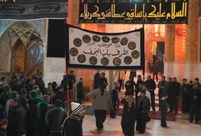 أحد المواكب أثناء دخولها باب قبلة أبي الفضل العباس عليه السلام