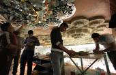 المباشرة بأعمال تغليف السقوف الثانوية والديكورات الخاصة بالسطح الداخلي لمشروع توسعة حرم أبي الفضل العباس عليه السلام بتسقيف صحنه الشريف