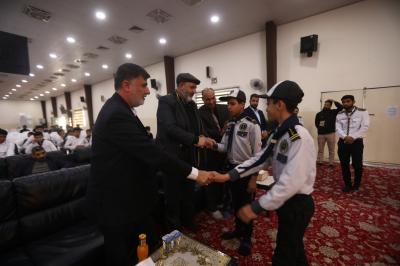 تكريم احد ابطال جمعية كشافة الكفيل من قبل مدير مكتب المتولي الشرعي للعتبة العباسية الدكتور افضل الشامي
