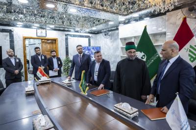 اثناء توقيع اتفاقية التعاون المشترك بين العتبة العباسية ووزارة التخطيط 