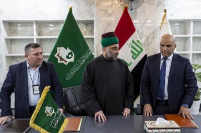 اثناء توقيع اتفاقية التعاون المشترك بين العتبة العباسية ووزارة التخطيط 