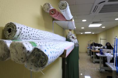 صور من معمل السيدة امنه للخياطة