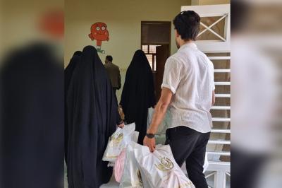 تقديم المستلزمات المدرسية والألعاب 