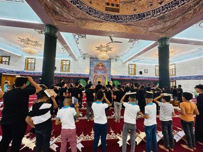 في قضاء الهندية... المجمع العلمي يقيم مجلساً عزائياً بمشاركة طلبة حفظ القرآن