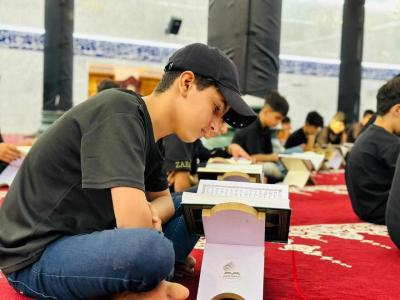 في قضاء الهندية... المجمع العلمي يقيم مجلساً عزائياً بمشاركة طلبة حفظ القرآن
