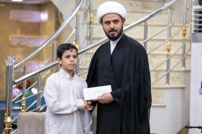 المجمع العلمي يكافئ مجموعة من طلبته الحافظين لكتاب الله