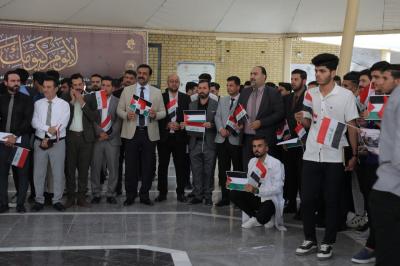 جامعة العميد تنظم وقفة تأييد لموقف المرجعية العليا بشأن ما يتعرض له الشعب الفلسطيني