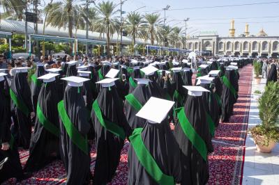 رسائل في العفة وحفظ الحجاب تبعثها مسيرة الطالبات عند ساحة ما بين الحرمين