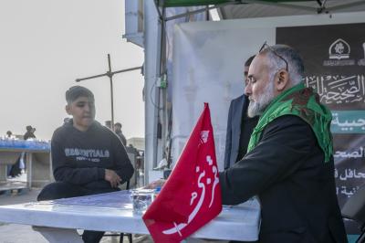 المجمع العلمي يقيم محطة لتعليم القراءة الصحيحة للزائرين بمدينة الكاظمية بذكرى شهادة الإمام الكاظم (عليه السلام)