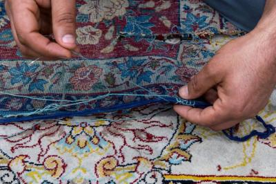 متحف الكفيل يواصل أعمال صيانة المجموعة الرابعة لمقتنيات العتبة العسكرية المقدسة