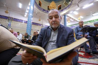 المجمع العلمي يواصل تنفيذ برنامج قراءة صفحة من القرآن الكريم في صلاح الدين
