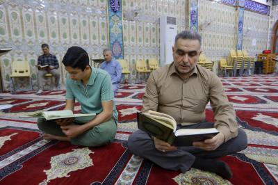المجمع العلمي يواصل تنفيذ برنامج قراءة صفحة من القرآن الكريم في صلاح الدين