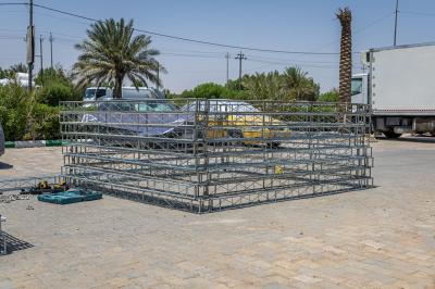 قسم الصناعات يباشر تركيب هياكل معدنية خاصة بالموكب الثقافي العام الواقع على محور النجف الأشرف