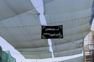 قسم حفظ النظام ينشر اللافتات الإرشادية في محيط العتبة العباسية المقدسة