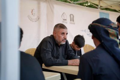المجمع العلمي ينظّم محفلًا قرآنيًّا ويقدم خدمات معرفية لزائري الأربعين