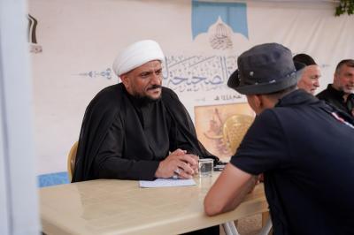 المجمع العلمي ينظّم محفلًا قرآنيًّا ويقدم خدمات معرفية لزائري الأربعين