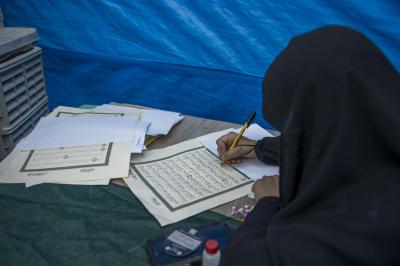 المجمع العلمي ينظّم محفلًا قرآنيًّا ويقدم خدمات معرفية لزائري الأربعين