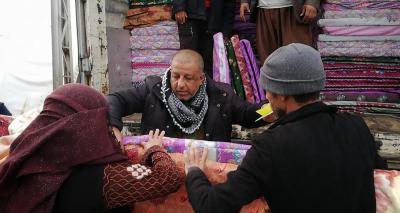 عقد من العطاء العابر للأزمات: مرجعية النجف الأشرف  بمواجهة النزوح والجائحة والجفاف