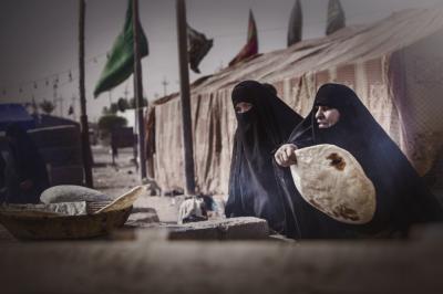 Scenes from the Road to Paradise, pilgrims are longing to reach Karbala.