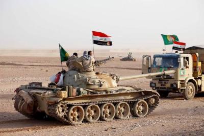 من ذاكرة الفتوى: الإعلان عن تشكيل فرقة العبّاس (عليه السلام) القتاليّة للدفاع عن العراق ومقدّساته