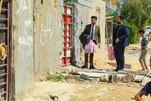 جامعة العميد تنظم مبادرة لتوزيع كسوة العيد على العوائل المتعففة في كربلاء