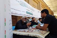 المجمع العلمي يواصل تقديم خدماته القرآنية لزائري الأربعين في بغداد