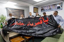 قسم الشعائر يسلم رايات الحزن العاشورائي لممثلياته في المحافظات الوسطى والجنوبية