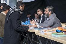 المجمع العلمي يفتتح محطة قرآنية لتعليم القراءة الصحيحة لزائري النصف من شعبان في مجمع العلقمي
