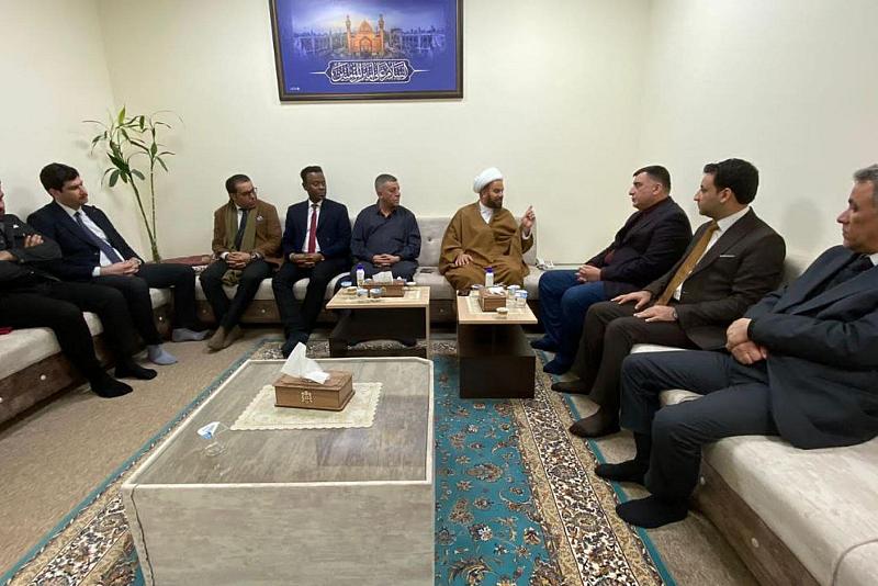 المركز العراقي يبحث مع وفد أمني سبل توثيق جرائم التطرف 