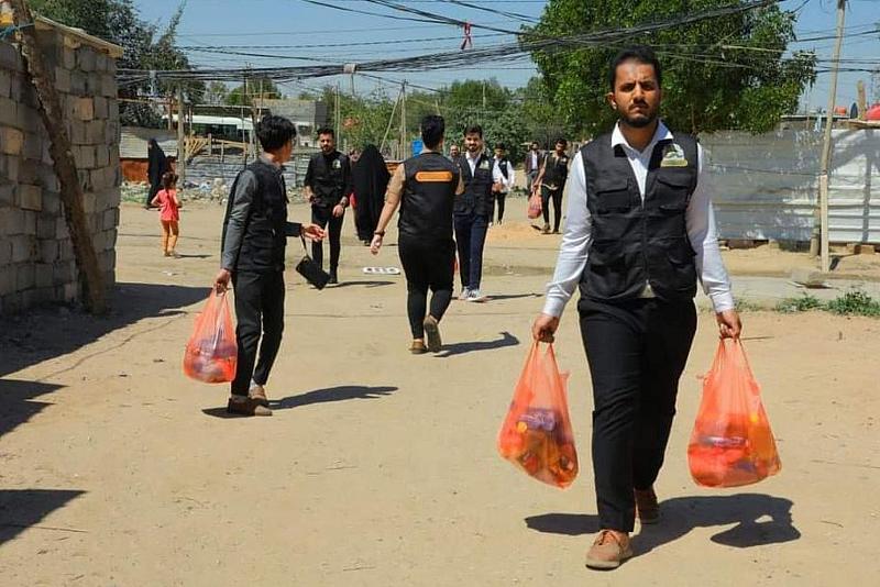 جامعة العميد توزع سلّات غذائية على العوائل المتعففة في كربلاء