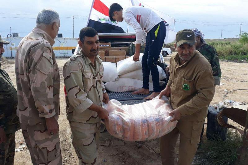 دعمٌ لوجستيّ لمقاتلي الحشد الشعبيّ وتوزيع سلّات غذائيّة على عوائل الشهداء في محافظة بابل