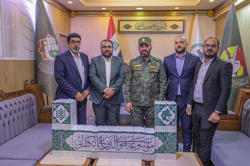 مؤسّسة الوافي تهدي فرقة العباس (عليه السلام) النسخة النهائية من موسوعة فتوى الدفاع الكفائي