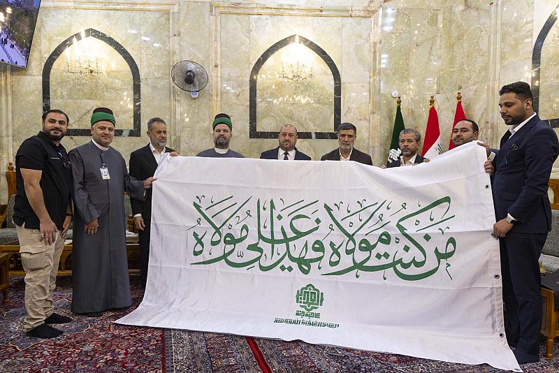 العتبة العباسية المقدسة تستلم راية عيد الغدير الأغر من وفد العتبة العلوية المقدسة