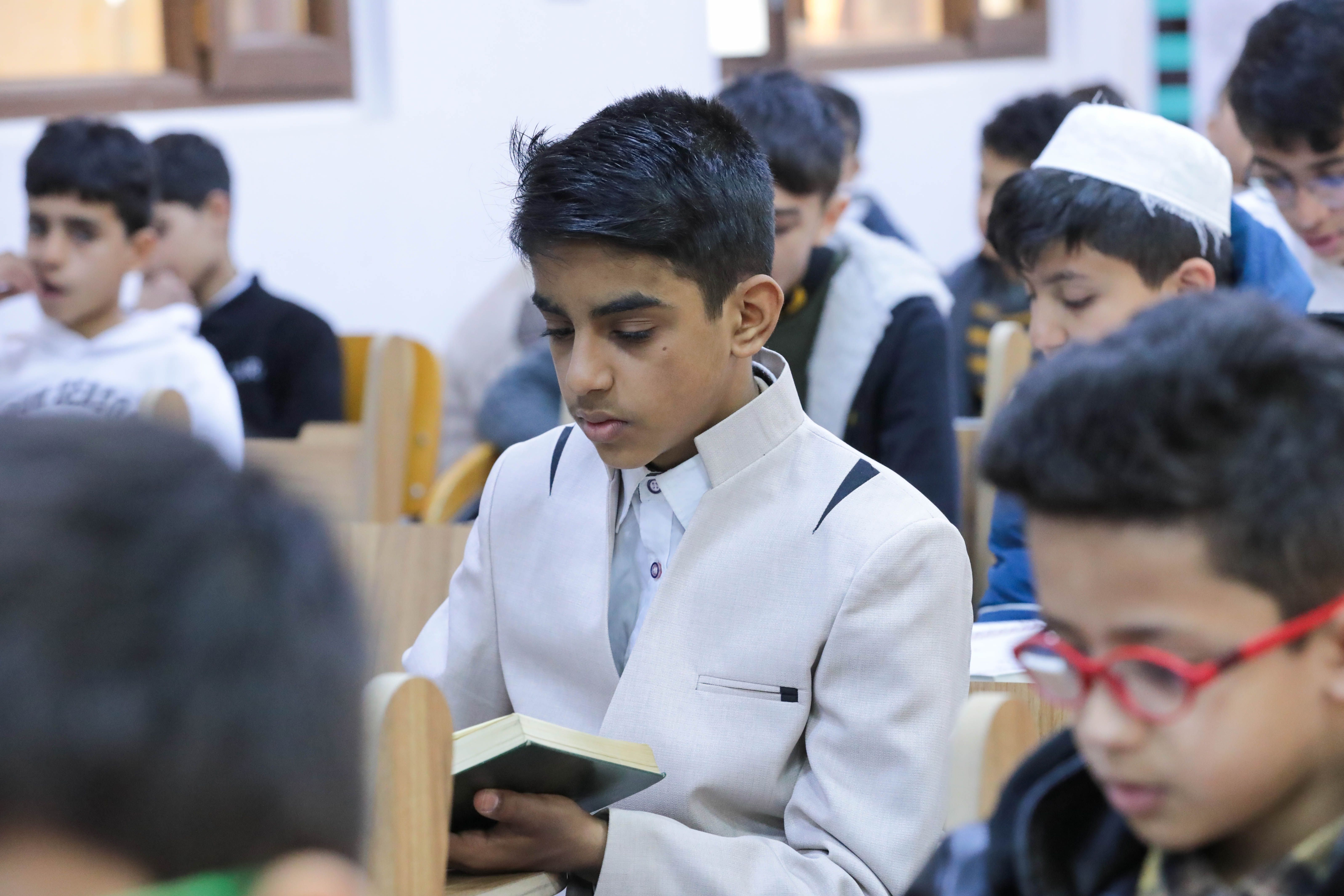 طلبة مشروع حفظ القرآن الكريم يشاركون في الاختبار المركزي بكربلاء المقدسة
