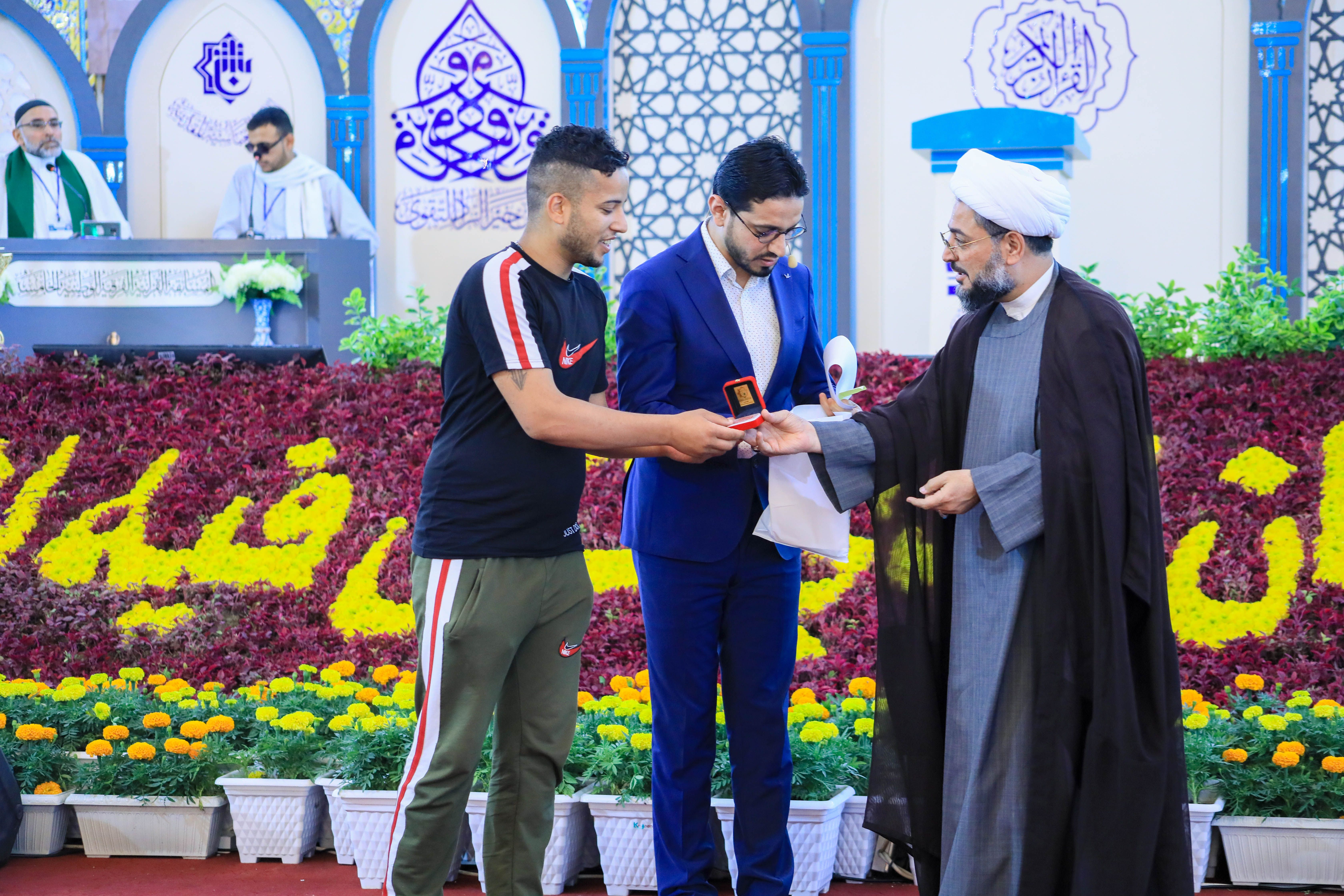 جانب من لقاء  فريقي محافظة البصرة ومحافظة بغداد في الجولة الخامسة ضمن المرحلة الأولى من المسابقة القرآنية الفرقية الوطنية الخامسة