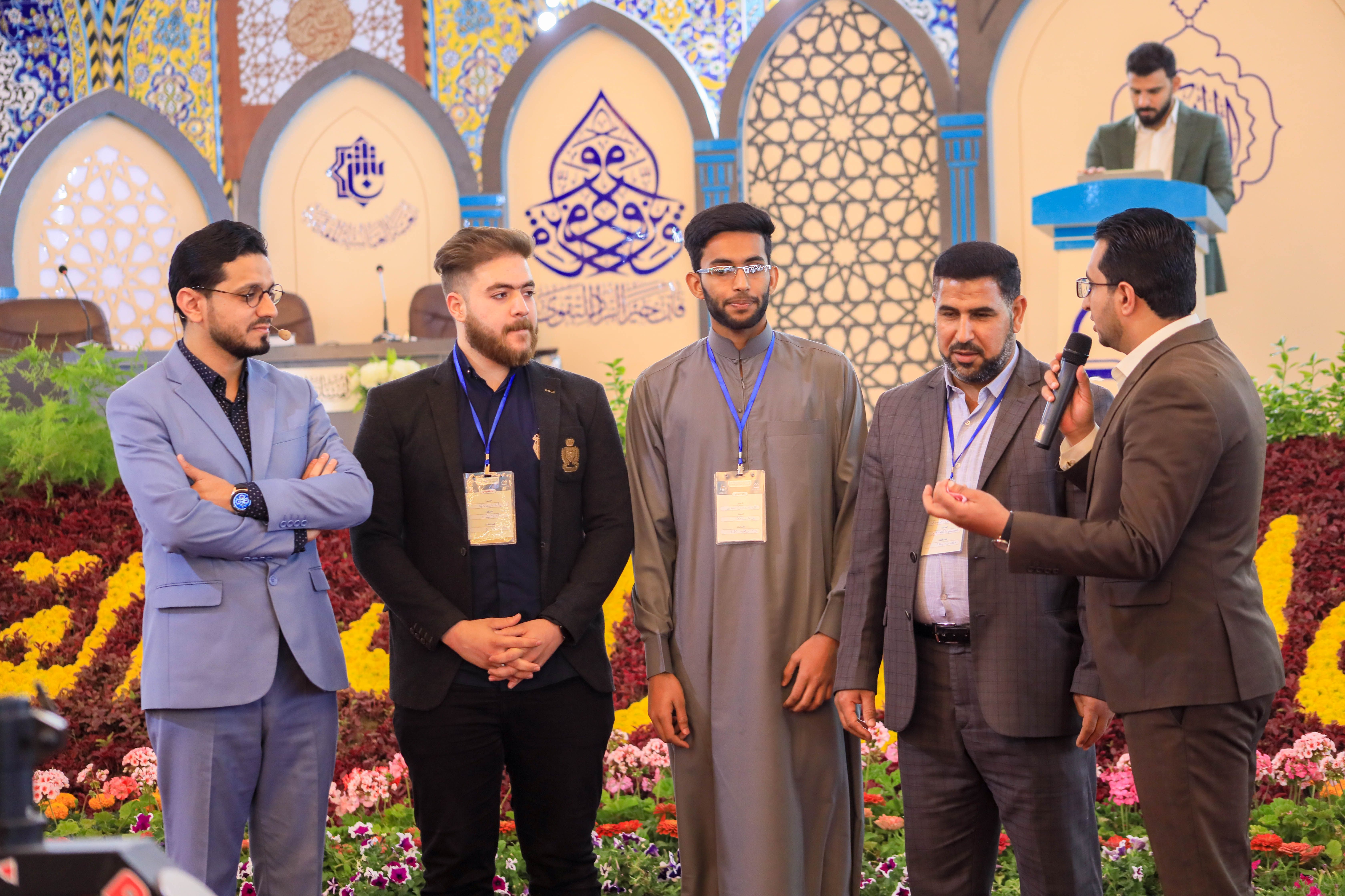 جانب من لقاء فريقي بغداد (أ) وكربلاءالمقدسة (ب) في المرحلة الثانية من المسابقة القرآنية الفرقية الوطنية الخامسة