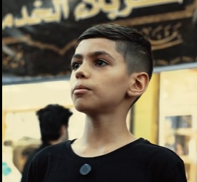 وراثة العطاء الحسيني.. الطفلان حسين ومهدي يسقيان زائري كربلاء المقدسة
