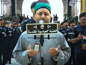 كوكبة من خريجي المعهد العالي للتطوير الأمني والإداري يؤدون قسم تخرجهم عند مرقد أبي الفضل العباس (عليه السلام)