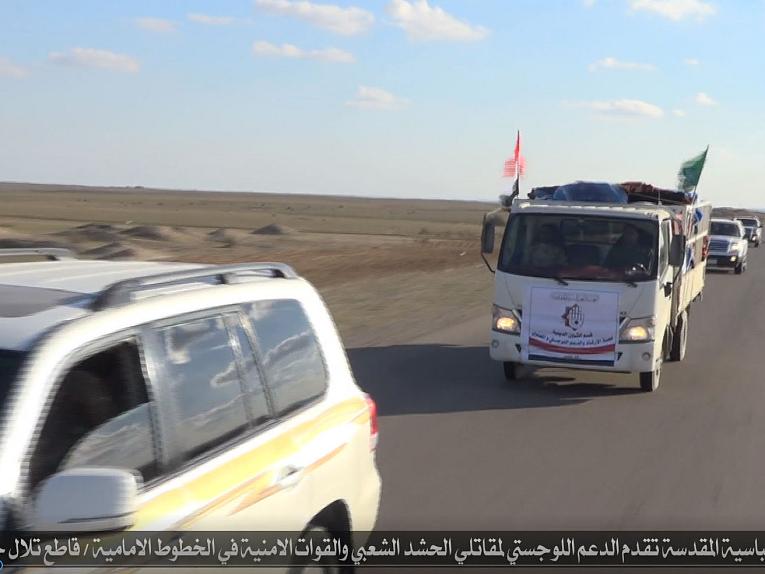 وفد العتبة العباسية المقدسة يقدم مساعدات الى القوات الأمنية والحشد الشعبي في قاطع حمرين 